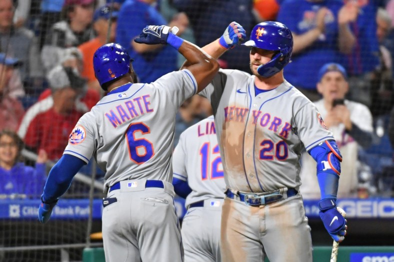 May 5, 2022; Philadelphia, Pennsylvania, USA; New York Mets right fielder Starling Marte (6) and designated hitter Pete Alonso (20) celebrate against the Philadelphia Phillies during the ninth inning at Citizens Bank Park. Mandatory Credit: Eric Hartline-USA TODAY Sports