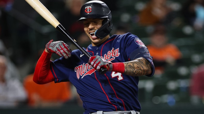 May 5, 2022; Baltimore, Maryland, USA; Minnesota Twins shortstop Carlos Correa (4) reacts after injuring his hand during the seventh inning of the game against the Baltimore Orioles at Oriole Park at Camden Yards. Mandatory Credit: Scott Taetsch-USA TODAY Sports