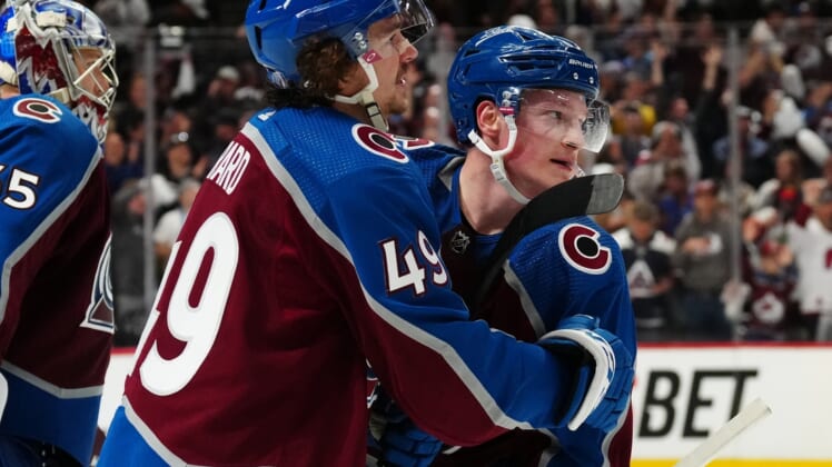 May 5, 2022; Denver, Colorado, USA; Colorado Avalanche defenseman Cale Makar (8) celebrates his overtime winning goal with defenseman Samuel Girard (49) against the Nashville Predators of game two of the first round of the 2022 Stanley Cup Playoffs at Ball Arena. Mandatory Credit: Ron Chenoy-USA TODAY Sports