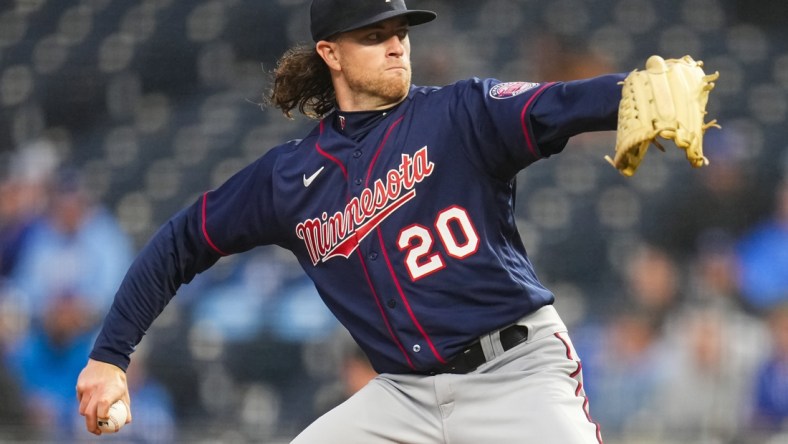 Apr 20, 2022; Kansas City, Missouri, USA; Minnesota Twins starting pitcher Chris Paddack (20) pitches against the Kansas City Royals during the first inning at Kauffman Stadium. Mandatory Credit: Jay Biggerstaff-USA TODAY Sports