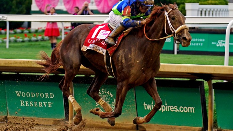 May 6, 2022; Louisville, KY, USA; Luis Saez aboard Secret Oath wins the Kentucky Oaks at Churchill Downs. Mandatory Credit: Peter Casey-USA TODAY Sports