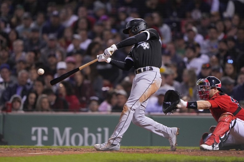 May 6, 2022; Boston, Massachusetts, USA; Chicago White Sox shortstop Tim Anderson (7) hits a single against the Boston Red Sox during the third inning at Fenway Park. Mandatory Credit: Gregory Fisher-USA TODAY Sports
