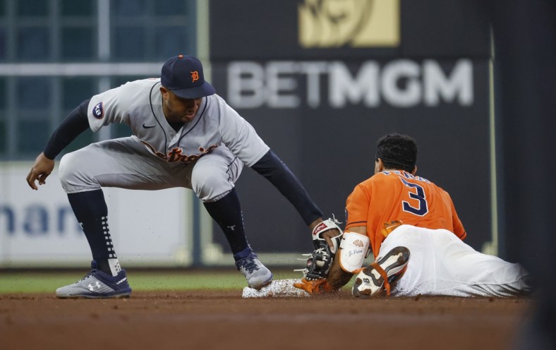 May 6, 2022; Houston, Texas, USA; Houston Astros shortstop Jeremy Pena (3) is safe at second base as Detroit Tigers second baseman Jonathan Schoop (7) attempts to apply a tag during the second inning at Minute Maid Park. Mandatory Credit: Troy Taormina-USA TODAY Sports
