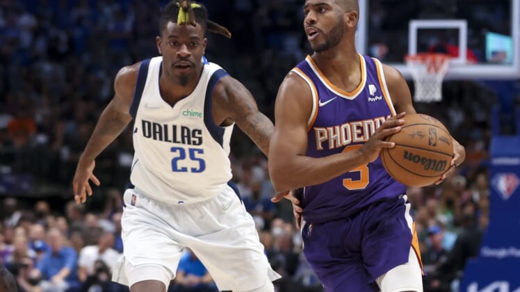 May 6, 2022; Dallas, Texas, USA; Phoenix Suns guard Chris Paul (3) controls the ball as Dallas Mavericks forward Reggie Bullock (25) defends during the first quarter in game three of the second round of the 2022 NBA playoffs at American Airlines Center. Mandatory Credit: Kevin Jairaj-USA TODAY Sports