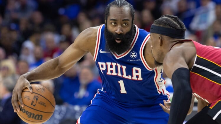 May 6, 2022; Philadelphia, Pennsylvania, USA; Philadelphia 76ers guard James Harden (1) dribbles the ball against Miami Heat forward Jimmy Butler (22) during the third quarter in game three of the second round for the 2022 NBA playoffs at Wells Fargo Center. Mandatory Credit: Bill Streicher-USA TODAY Sports