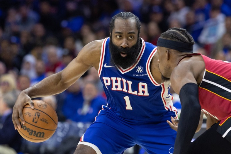May 6, 2022; Philadelphia, Pennsylvania, USA; Philadelphia 76ers guard James Harden (1) dribbles the ball against Miami Heat forward Jimmy Butler (22) during the third quarter in game three of the second round for the 2022 NBA playoffs at Wells Fargo Center. Mandatory Credit: Bill Streicher-USA TODAY Sports