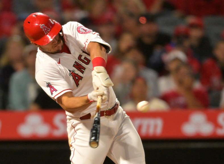 May 6, 2022; Anaheim, California, USA;  Los Angeles Angels center fielder Mike Trout (27) doubles in two runs in the fifth inning against the Washington Nationals at Angel Stadium. Mandatory Credit: Jayne Kamin-Oncea-USA TODAY Sports