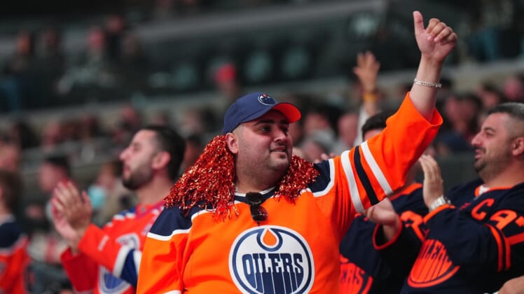 May 6, 2022; Los Angeles, California, USA; Edmonton Oilers fans react in the second period of game three of the first round of the 2022 Stanley Cup Playoffs against the LA Kings at Crypto.com Arena. Mandatory Credit: Kirby Lee-USA TODAY Sports