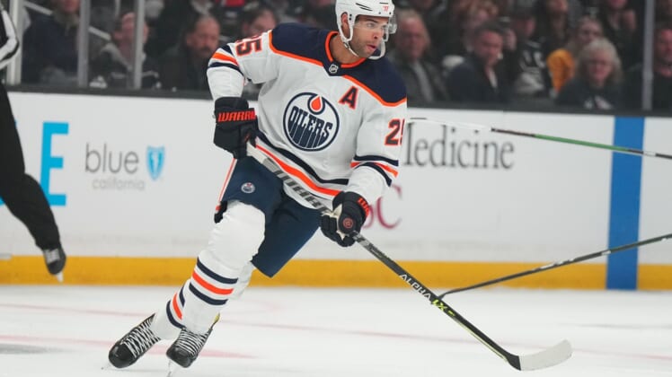 May 6, 2022; Los Angeles, California, USA; Edmonton Oilers defenseman Darnell Nurse (25) skates with the puck against the LA Kings in the first period of game three of the first round of the 2022 Stanley Cup Playoffs at Crypto.com Arena. Mandatory Credit: Kirby Lee-USA TODAY Sports