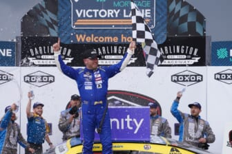 May 7, 2022; Darlington, South Carolina, USA; NASCAR Xfinity Series driver Justin Allgaier (7) celebrates after winning the Mahindra ROXOR 200 at Darlington Raceway. Mandatory Credit: Jasen Vinlove-USA TODAY Sports