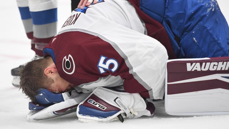 May 7, 2022; Nashville, Tennessee, USA; Colorado Avalanche goaltender Darcy Kuemper (35) falls to the ice after an injury during the first period against the Nashville Predators in game three of the first round of the 2022 Stanley Cup Playoffs at Bridgestone Arena. Mandatory Credit: Christopher Hanewinckel-USA TODAY Sports