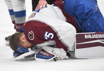May 7, 2022; Nashville, Tennessee, USA; Colorado Avalanche goaltender Darcy Kuemper (35) falls to the ice after an injury during the first period against the Nashville Predators in game three of the first round of the 2022 Stanley Cup Playoffs at Bridgestone Arena. Mandatory Credit: Christopher Hanewinckel-USA TODAY Sports