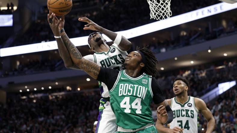 May 7, 2022; Milwaukee, Wisconsin, USA; Milwaukee Bucks forward Bobby Portis (9) and Boston Celtics center Robert Williams III (44) battle for a rebounbd during the third quarter during game three of the second round for the 2022 NBA playoffs at Fiserv Forum. Mandatory Credit: Jeff Hanisch-USA TODAY Sports