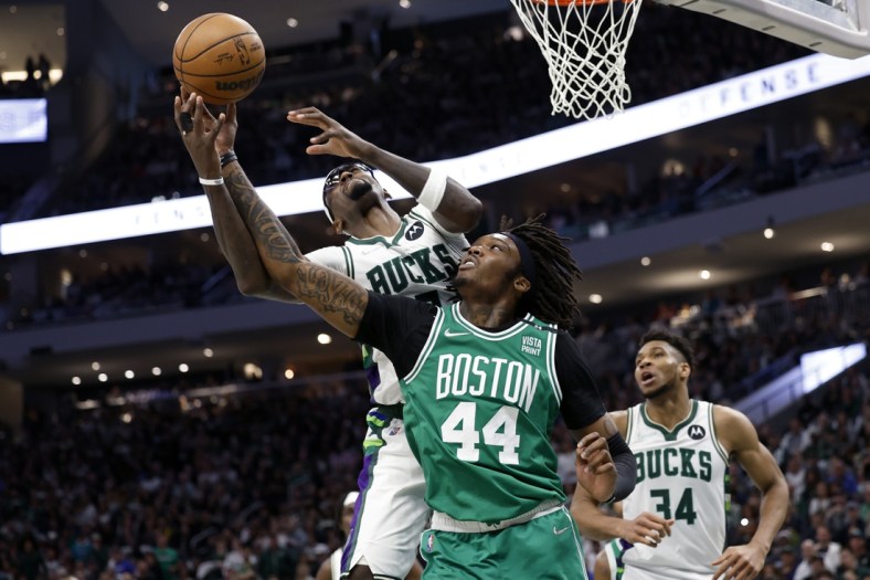 May 7, 2022; Milwaukee, Wisconsin, USA; Milwaukee Bucks forward Bobby Portis (9) and Boston Celtics center Robert Williams III (44) battle for a rebounbd during the third quarter during game three of the second round for the 2022 NBA playoffs at Fiserv Forum. Mandatory Credit: Jeff Hanisch-USA TODAY Sports