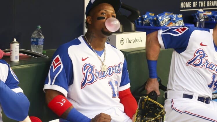 May 7, 2022; Atlanta, Georgia, USA; Atlanta Braves right fielder Ronald Acuna Jr. (13) blows a bubble before a game against the Milwaukee Brewers at Truist Park. Mandatory Credit: Brett Davis-USA TODAY Sports