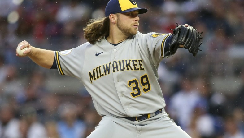 May 7, 2022; Atlanta, Georgia, USA; Milwaukee Brewers starting pitcher Corbin Burnes (39) throws against the Atlanta Braves in the first inning at Truist Park. Mandatory Credit: Brett Davis-USA TODAY Sports