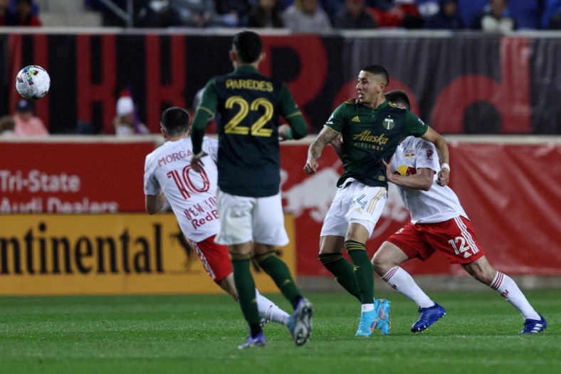 May 7, 2022; Harrison, New Jersey, USA;  Portland Timbers midfielder Marvin Lor  a (44) handles the ball against New York Red Bulls defender Dylan Nealis (12) during the second half at Red Bull Arena. Mandatory Credit: Vincent Carchietta-USA TODAY Sports