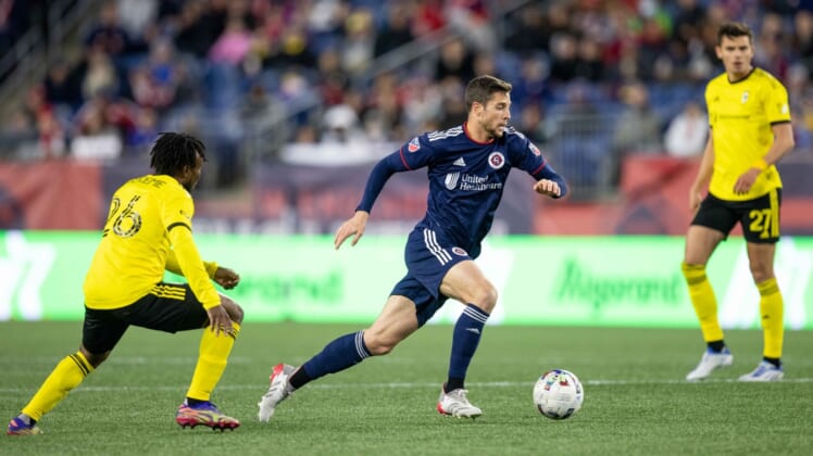 May 7, 2022; Foxborough, Massachusetts, USA; New England Revolution midfielder Matt Polster (8) possesses the ball during the first half against the Columbus Crew at Gillette Stadium. Mandatory Credit: Paul Rutherford-USA TODAY Sports