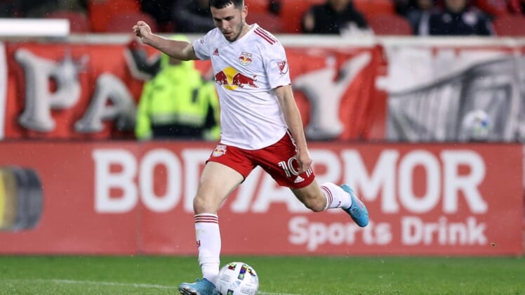 May 7, 2022; Harrison, New Jersey, USA;  New York Red Bulls midfielder Lewis Morgan (10) shoots the ball against the Portland Timbers during the second half at Red Bull Arena. Mandatory Credit: Vincent Carchietta-USA TODAY Sports