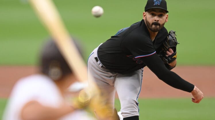 May 7, 2022; San Diego, California, USA; Miami Marlins starting pitcher Pablo Lopez (49) throws a pitch against the San Diego Padres during the first inning at Petco Park. Mandatory Credit: Orlando Ramirez-USA TODAY Sports