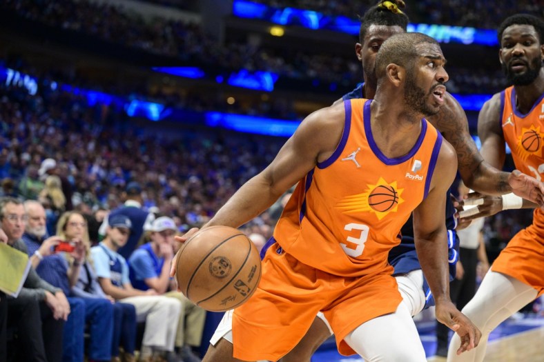 May 8, 2022; Dallas, Texas, USA; Phoenix Suns guard Chris Paul (3) controls the ball in the Dallas Mavericks zone during the second quarter during game four of the second round for the 2022 NBA playoffs at American Airlines Center. Mandatory Credit: Jerome Miron-USA TODAY Sports
