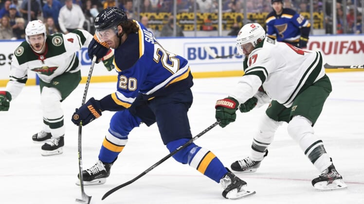 May 8, 2022; St. Louis, Missouri, USA; St. Louis Blues left wing Brandon Saad (20) takes a shot against the Minnesota Wild during the first period in game four of the first round of the 2022 Stanley Cup Playoffs at Enterprise Center. Mandatory Credit: Jeff Le-USA TODAY Sports