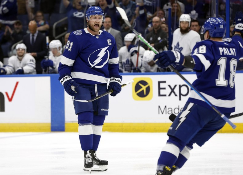 May 8, 2022; Tampa, Florida, USA; Tampa Bay Lightning center Steven Stamkos (91) celebrates with left wing Ondrej Palat (18) as he scores a goal during the first period of game four of the first round of the 2022 Stanley Cup Playoffs against the Toronto Maple Leafs at Amalie Arena. Mandatory Credit: Kim Klement-USA TODAY Sports