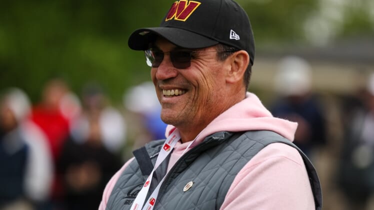 May 8, 2022; Potomac, Maryland, USA; Washington Commander head coach Ron Rivera watches the trophy presentation on the 18th green of the Wells Fargo Championship golf tournament. Mandatory Credit: Scott Taetsch-USA TODAY Sports
