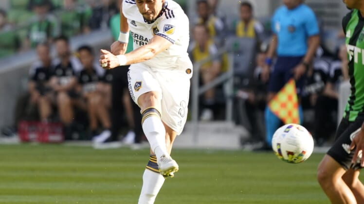 May 8, 2022; Austin, Texas, USA; Los Angeles Galaxy midfielder Marco Delgado (8) scores a goal in the first half against the Los Angeles Galaxy at Q2 Stadium. Mandatory Credit: Scott Wachter-USA TODAY Sports