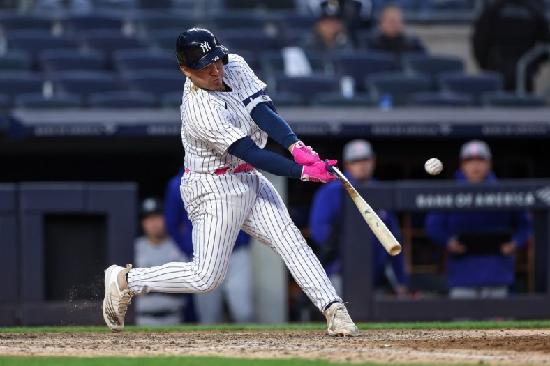 May 8, 2022; Bronx, New York, USA; New York Yankees catcher Jose Trevino (39) hits a broken bat single during the seventh inning against the Texas Rangers at Yankee Stadium. Mandatory Credit: Vincent Carchietta-USA TODAY Sports
