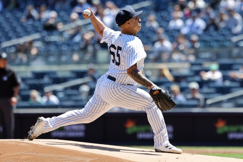 May 9, 2022; Bronx, New York, USA; New York Yankees starting pitcher Nestor Cortes (65) delivers against the Texas Rangers during the second inning at Yankee Stadium. Mandatory Credit: Jessica Alcheh-USA TODAY Sports