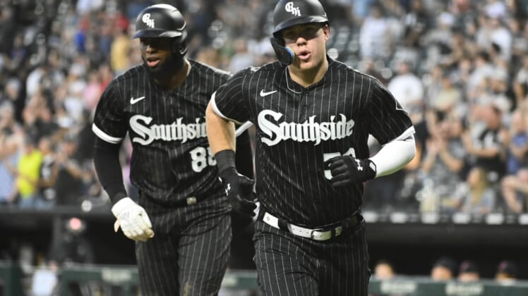 May 9, 2022; Chicago, Illinois, USA;  Chicago White Sox right fielder Gavin Sheets (32) with Chicago White Sox center fielder Luis Robert (88) after he hits a three run home run against the Cleveland Guardians at Guaranteed Rate Field. Mandatory Credit: Matt Marton-USA TODAY Sports
