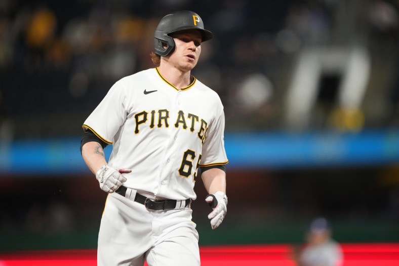 May 9, 2022; Pittsburgh, Pennsylvania, USA; Pittsburgh Pirates right fielder Jack Suwinski (65) rounds the bases after hitting a home run against the Los Angeles Dodgers  during the eighth inning at PNC Park. Mandatory Credit: Gregory Fisher-USA TODAY Sports