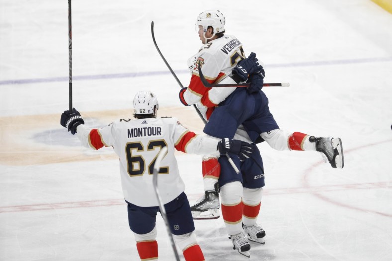 May 9, 2022; Washington, District of Columbia, USA; Florida Panthers center Carter Verhaeghe (23) celebrates with Panthers defenseman Radko Gudas (7) after scoring the game winning goal against the Washington Capitals in overtime in game four of the first round of the 2022 Stanley Cup Playoffs at Capital One Arena. Mandatory Credit: Geoff Burke-USA TODAY Sports