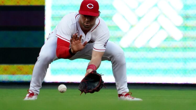 Cincinnati Reds shortstop Kyle Farmer (17) fields a groundball in the fourth inning of a baseball game against the Milwaukee Brewers, Monday, May 9, 2022, at Great American Ball Park in Cincinnati.Milwaukee Brewers At Cincinnati Reds May 9 0035