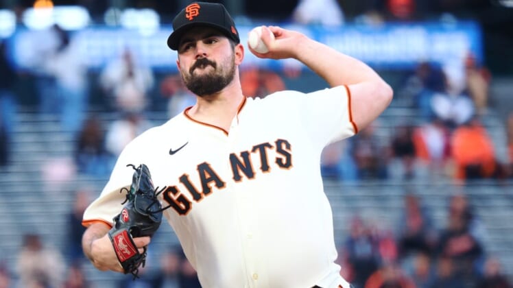 May 9, 2022; San Francisco, California, USA; San Francisco Giants starting pitcher Carlos Rodon (16) pitches the ball against the Colorado Rockies during the first inning at Oracle Park. Mandatory Credit: Kelley L Cox-USA TODAY Sports