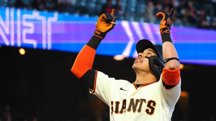 May 9, 2022; San Francisco, California, USA; San Francisco Giants center fielder Mauricio Dubon (1) gestures as he crosses the plate on a two-run home run against the Colorado Rockies during the third inning at Oracle Park. Mandatory Credit: Kelley L Cox-USA TODAY Sports