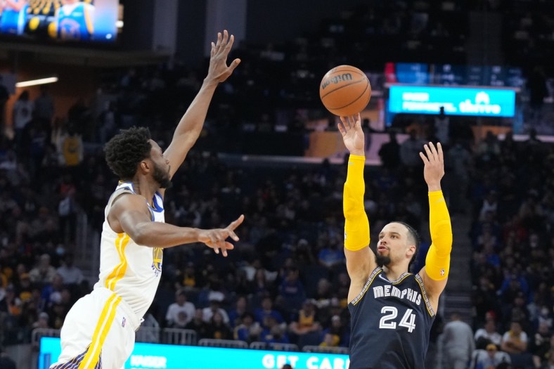 May 9, 2022; San Francisco, California, USA; Memphis Grizzlies forward Dillon Brooks (24) shoots the basketball against Golden State Warriors forward Andrew Wiggins (22) during the third quarter of game four of the second round for the 2022 NBA playoffs at Chase Center. Mandatory Credit: Kyle Terada-USA TODAY Sports