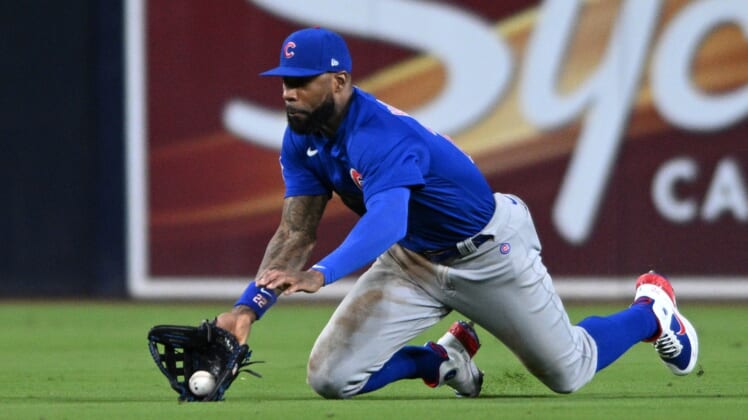 May 9, 2022; San Diego, California, USA; Chicago Cubs center fielder Jason Heyward (22) makes a diving catch on a line drive hit by San Diego Padres shortstop Ha-Seong Kim (not pictured) during the seventh inning at Petco Park. Mandatory Credit: Orlando Ramirez-USA TODAY Sports