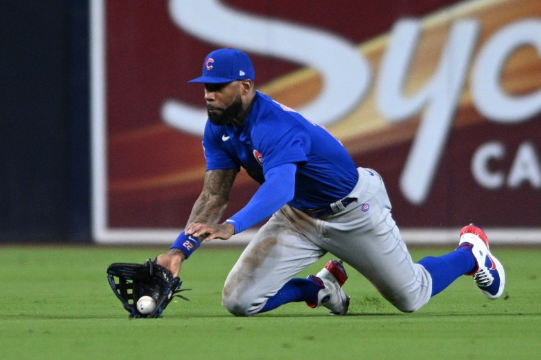 May 9, 2022; San Diego, California, USA; Chicago Cubs center fielder Jason Heyward (22) makes a diving catch on a line drive hit by San Diego Padres shortstop Ha-Seong Kim (not pictured) during the seventh inning at Petco Park. Mandatory Credit: Orlando Ramirez-USA TODAY Sports
