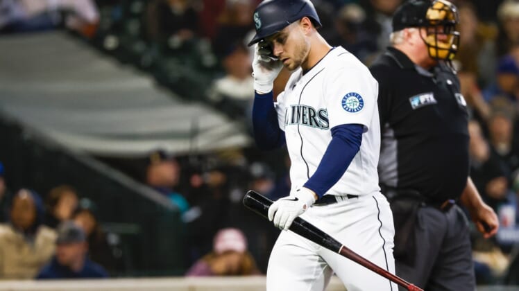 May 9, 2022; Seattle, Washington, USA; Seattle Mariners right fielder Jarred Kelenic (10) returns to the dugout after striking out against the Philadelphia Phillies during the second inning at T-Mobile Park. Mandatory Credit: Joe Nicholson-USA TODAY Sports