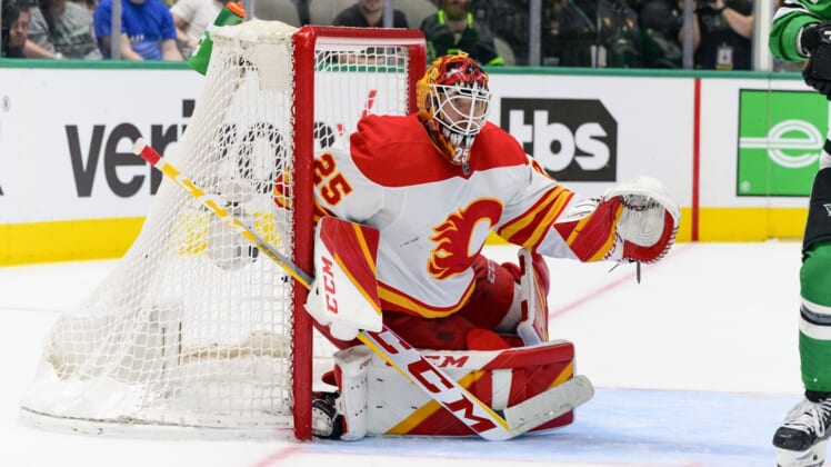 May 9, 2022; Dallas, Texas, USA; Calgary Flames goaltender Jacob Markstrom (25) faces the Dallas Stars attack during the third period in game four of the first round of the 2022 Stanley Cup Playoffs at American Airlines Center. Mandatory Credit: Jerome Miron-USA TODAY Sports
