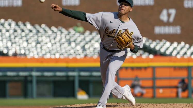 May 10, 2022; Detroit, Michigan, USA; Oakland Athletics starting pitcher Adrian Martinez (55) pitches during the third inning against the Detroit Tigers at Comerica Park. Mandatory Credit: Raj Mehta-USA TODAY Sports
