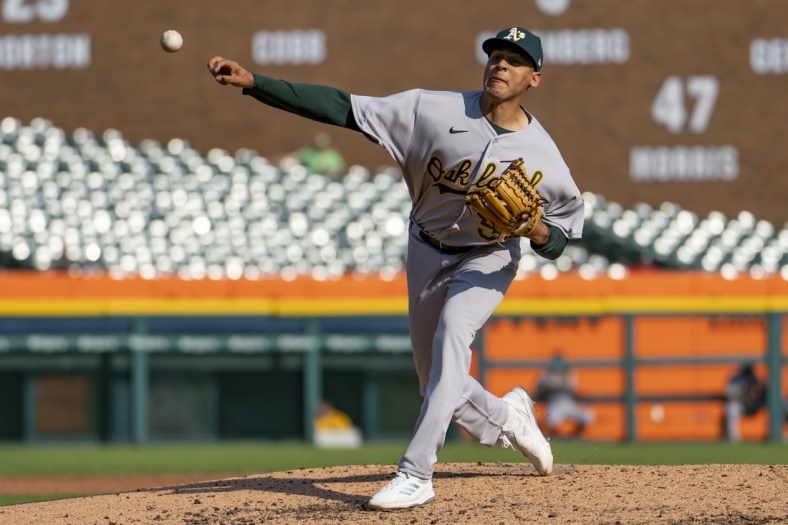 May 10, 2022; Detroit, Michigan, USA; Oakland Athletics starting pitcher Adrian Martinez (55) pitches during the third inning against the Detroit Tigers at Comerica Park. Mandatory Credit: Raj Mehta-USA TODAY Sports