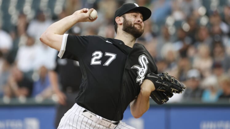 May 10, 2022; Chicago, Illinois, USA; Chicago White Sox starting pitcher Lucas Giolito (27) pitches against the Cleveland Guardians during the first inning at Guaranteed Rate Field. Mandatory Credit: Kamil Krzaczynski-USA TODAY Sports