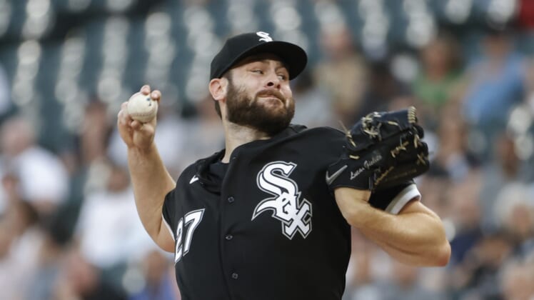 May 10, 2022; Chicago, Illinois, USA; Chicago White Sox starting pitcher Lucas Giolito (27) delivers against the Cleveland Guardians during the first inning at Guaranteed Rate Field. Mandatory Credit: Kamil Krzaczynski-USA TODAY Sports