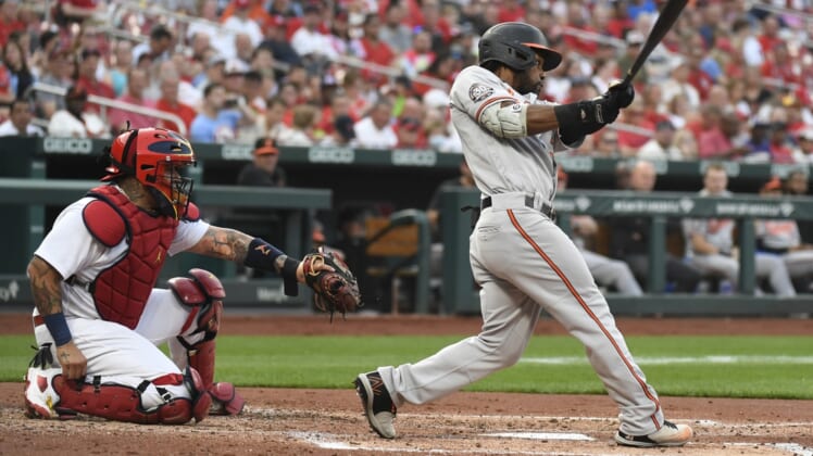 May 10, 2022; St. Louis, Missouri, USA; Baltimore Orioles center fielder Cedric Mullins (31) hits a two-run home run in the third inning against the St. Louis Cardinals at Busch Stadium. Mandatory Credit: Jeff Le-USA TODAY Sports