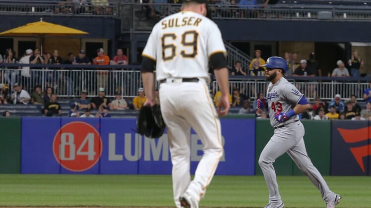 May 10, 2022; Pittsburgh, Pennsylvania, USA;  Los Angeles Dodgers designated hitter Edwin Rios (43) circles the bases on a three run home run against Pittsburgh Pirates relief pitcher Beau Sulser (69) during the seventh inning at PNC Park. Mandatory Credit: Charles LeClaire-USA TODAY Sports