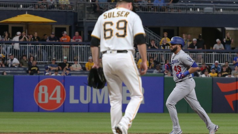 May 10, 2022; Pittsburgh, Pennsylvania, USA;  Los Angeles Dodgers designated hitter Edwin Rios (43) circles the bases on a three run home run against Pittsburgh Pirates relief pitcher Beau Sulser (69) during the seventh inning at PNC Park. Mandatory Credit: Charles LeClaire-USA TODAY Sports