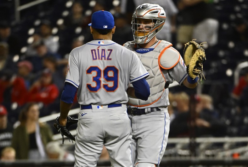 May 10, 2022; Washington, District of Columbia, USA; New York Mets relief pitcher Edwin Diaz (39) is congratulated by catcher James McCann (33) after earning a save against the Washington Nationals  at Nationals Park. Mandatory Credit: Brad Mills-USA TODAY Sports